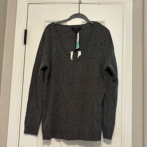 41 Hawthorn brand in size large. Dark gray in color.